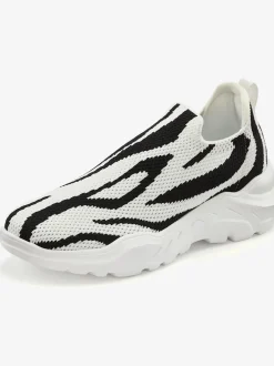 Baskets sneakers qui épousent parfaitement le pied grâce à la matière textile douce très confortable