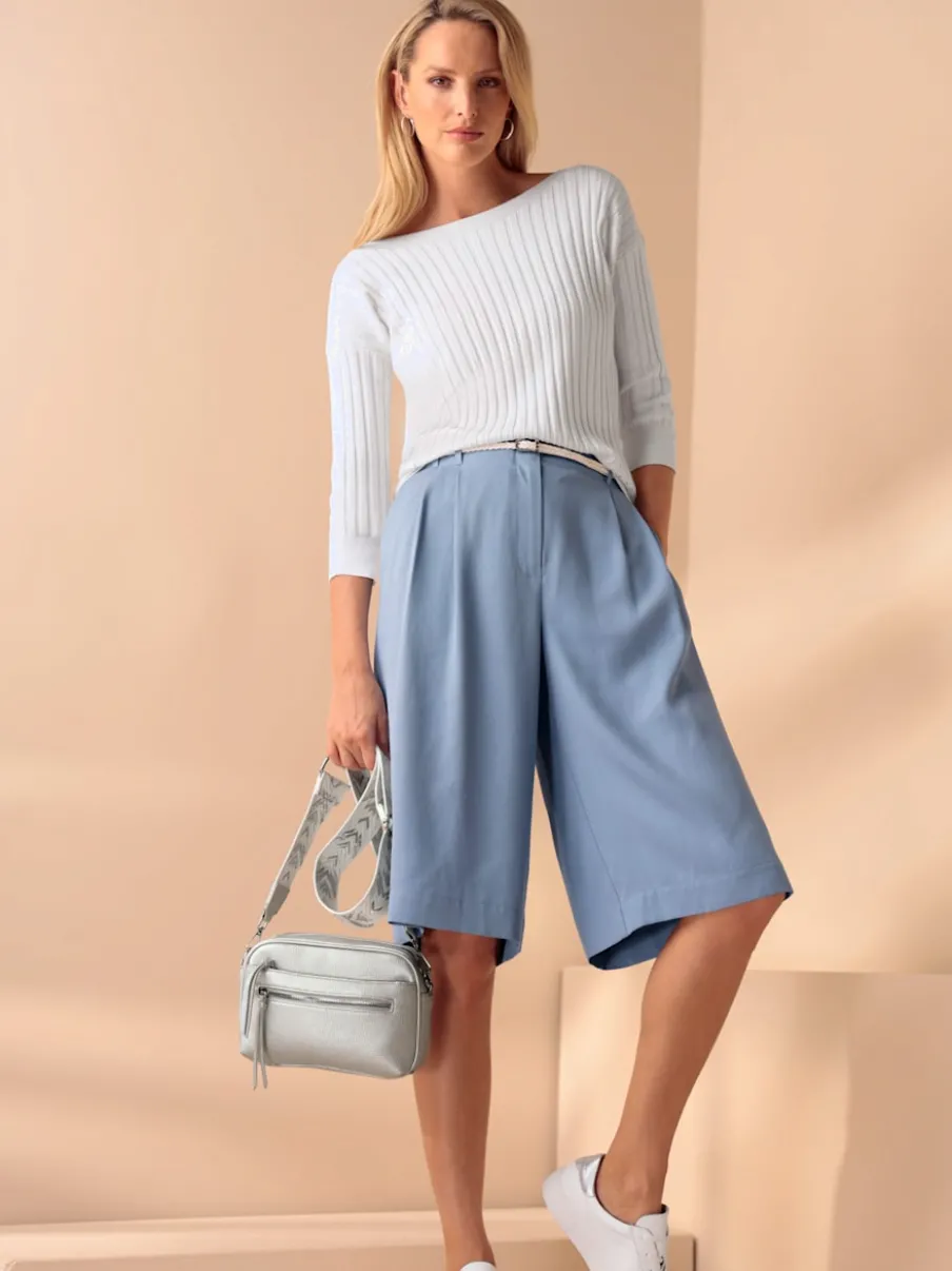 Bermuda de style sportif à jambes larges avec ceinture élastique