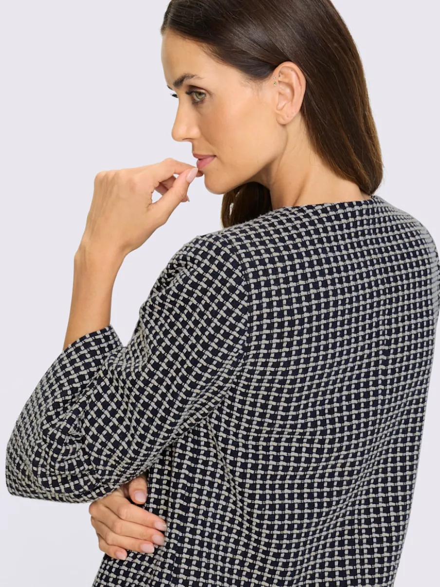 Blazer bouclé doux avec boutons fantaisie et volants