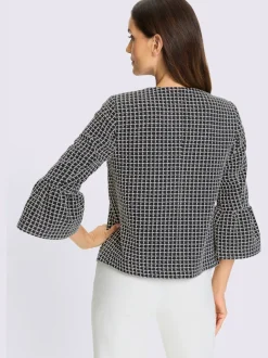 Blazer bouclé doux avec boutons fantaisie et volants