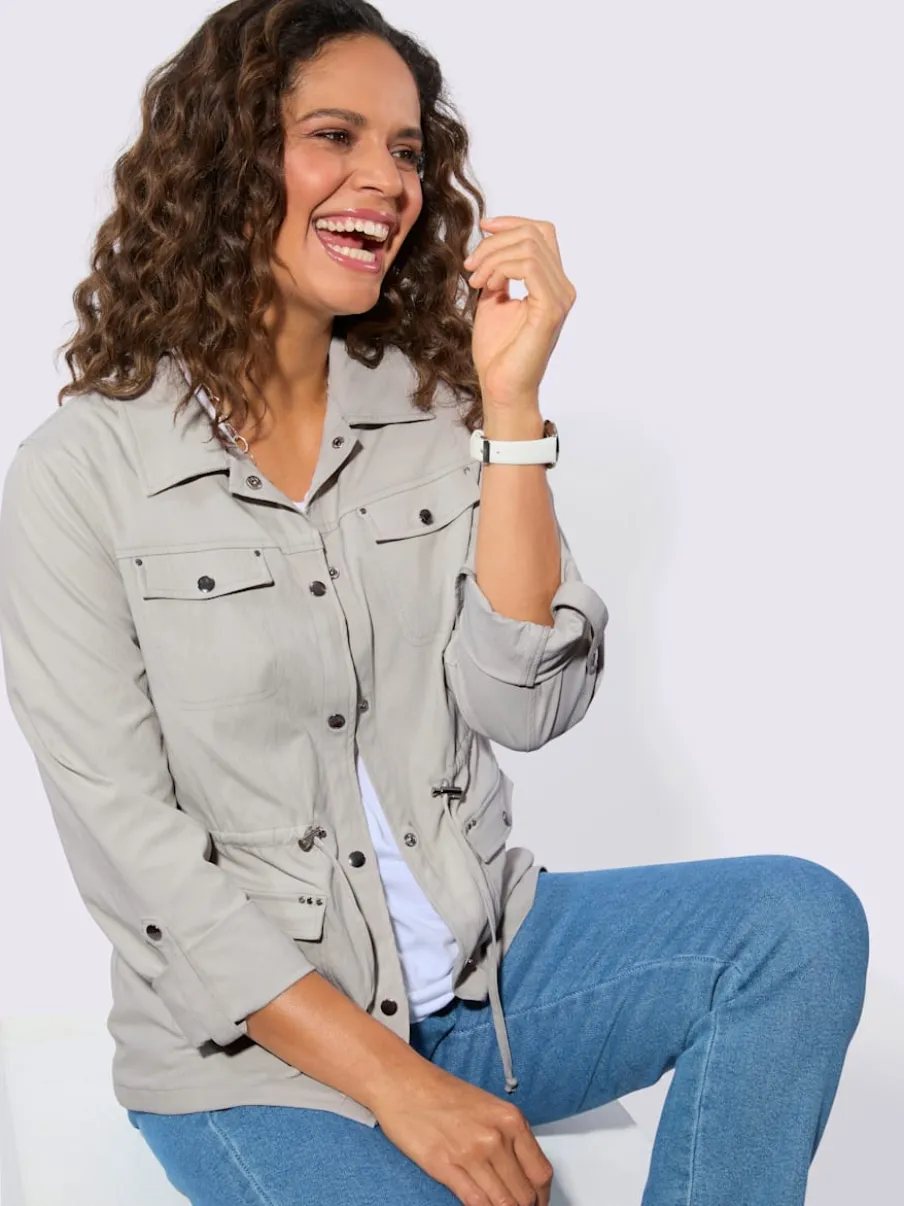 Blazer chemisier à col à revers avec poches plaquées