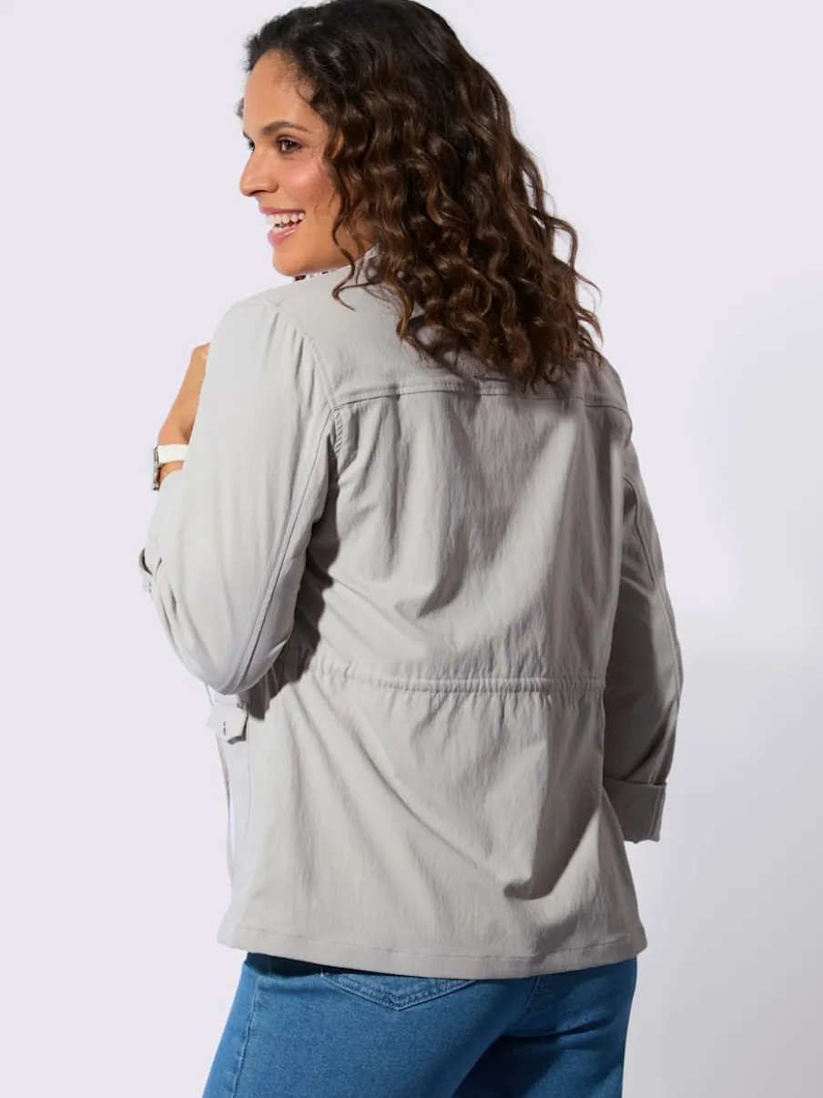 Blazer chemisier à col à revers avec poches plaquées
