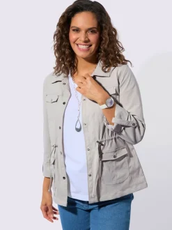 Blazer chemisier à col à revers avec poches plaquées