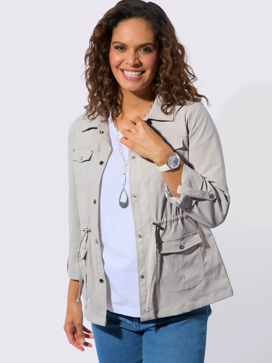 Blazer chemisier à col à revers avec poches plaquées