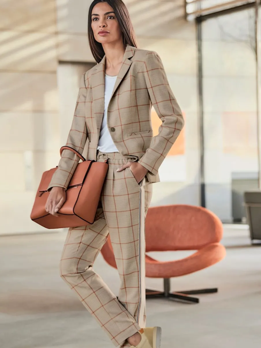 Blazer cintré à motif à carreaux avec poches passepoilées