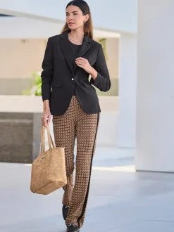 Blazer col à revers à effet affinant