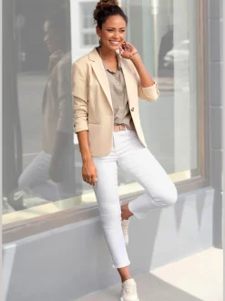 Blazer court à carreaux avec col à revers et poches passepoilées