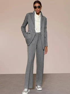 Blazer en jersey à col revers et manches longues avec motif chevron