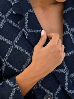 Blazer à motif structuré avec col à revers et poches