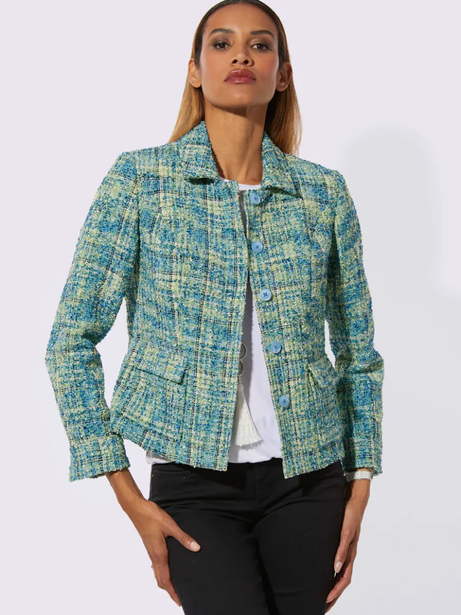 Blazers bouclés avec col chemise et manches longues.