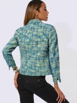 Blazers bouclés avec col chemise et manches longues.