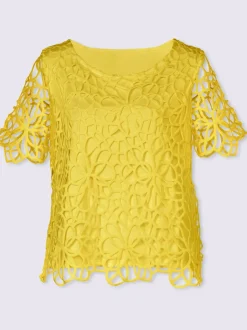 Blouse en dentelle avec col rond et manches courtes