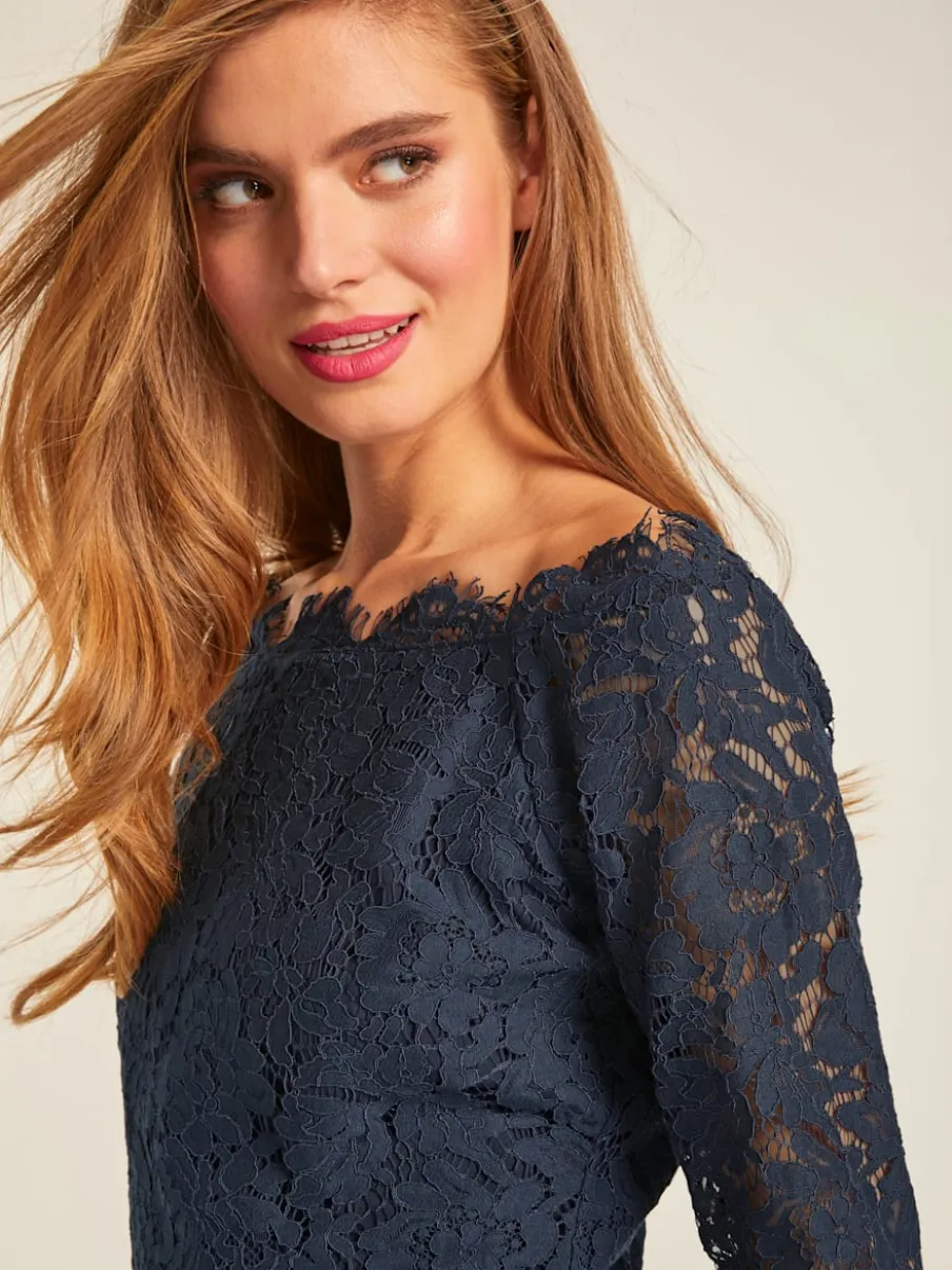 Blouse en dentelle raffinée à manches trois quarts