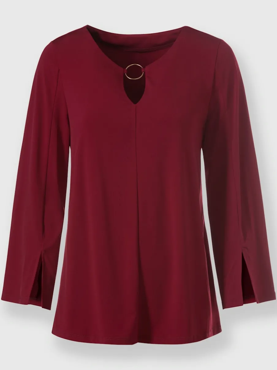 Blouse à manches trompette détails anneau fantaisie fluide