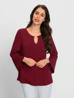 Blouse à manches trompette détails anneau fantaisie fluide
