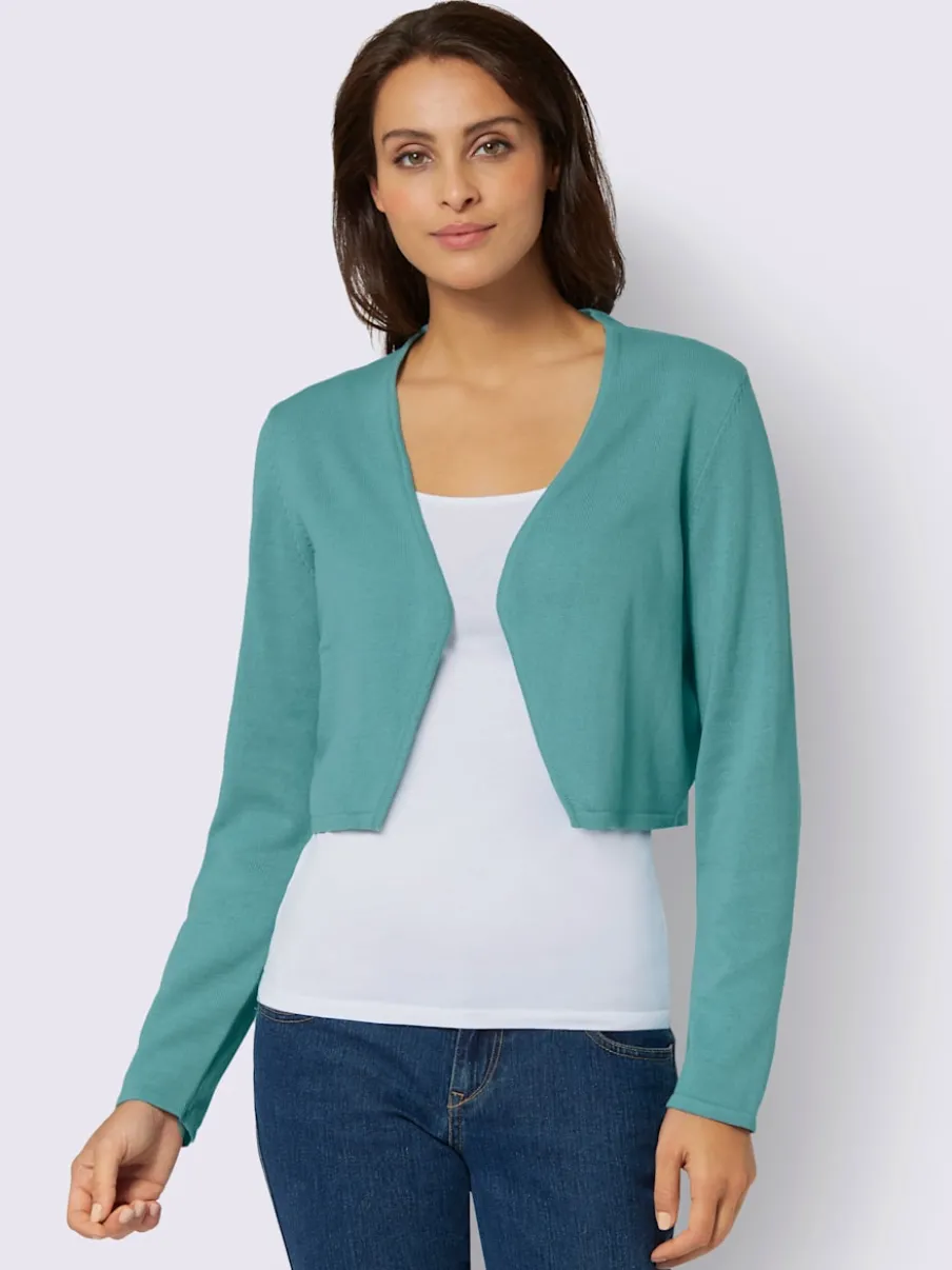 Boléro court en coton avec manches longues et finition soignée