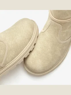 Bottines avec liens à nouer raffinés et motif structuré tendance