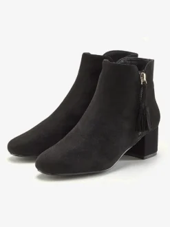 Bottines détails houppe tendance