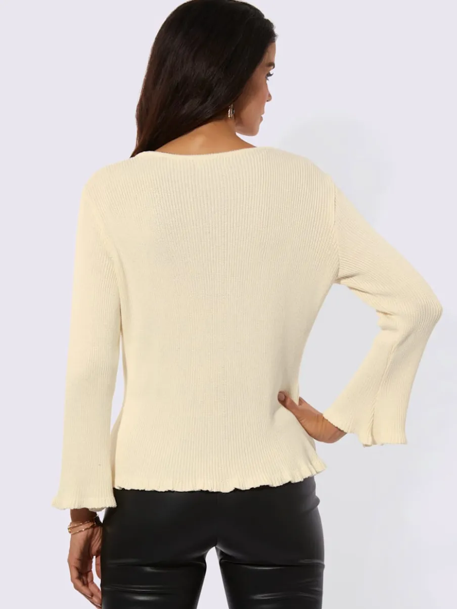 Cardigan à col rond et manches longues avec fleurs tricotées