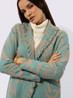 Cardigan en tricot jacquard avec col châle et franges