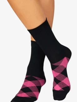 Chaussettes les motifs disparaissent dans la chaussure