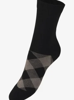 Chaussettes les motifs disparaissent dans la chaussure