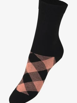Chaussettes les motifs disparaissent dans la chaussure