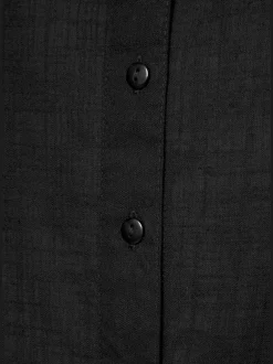 Chemisier avec patte de boutonnage et ourlet arrondi