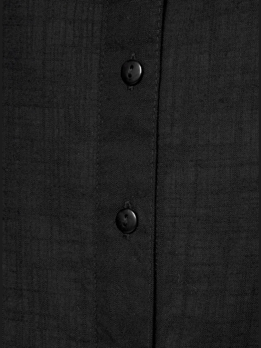 Chemisier avec patte de boutonnage et ourlet arrondi