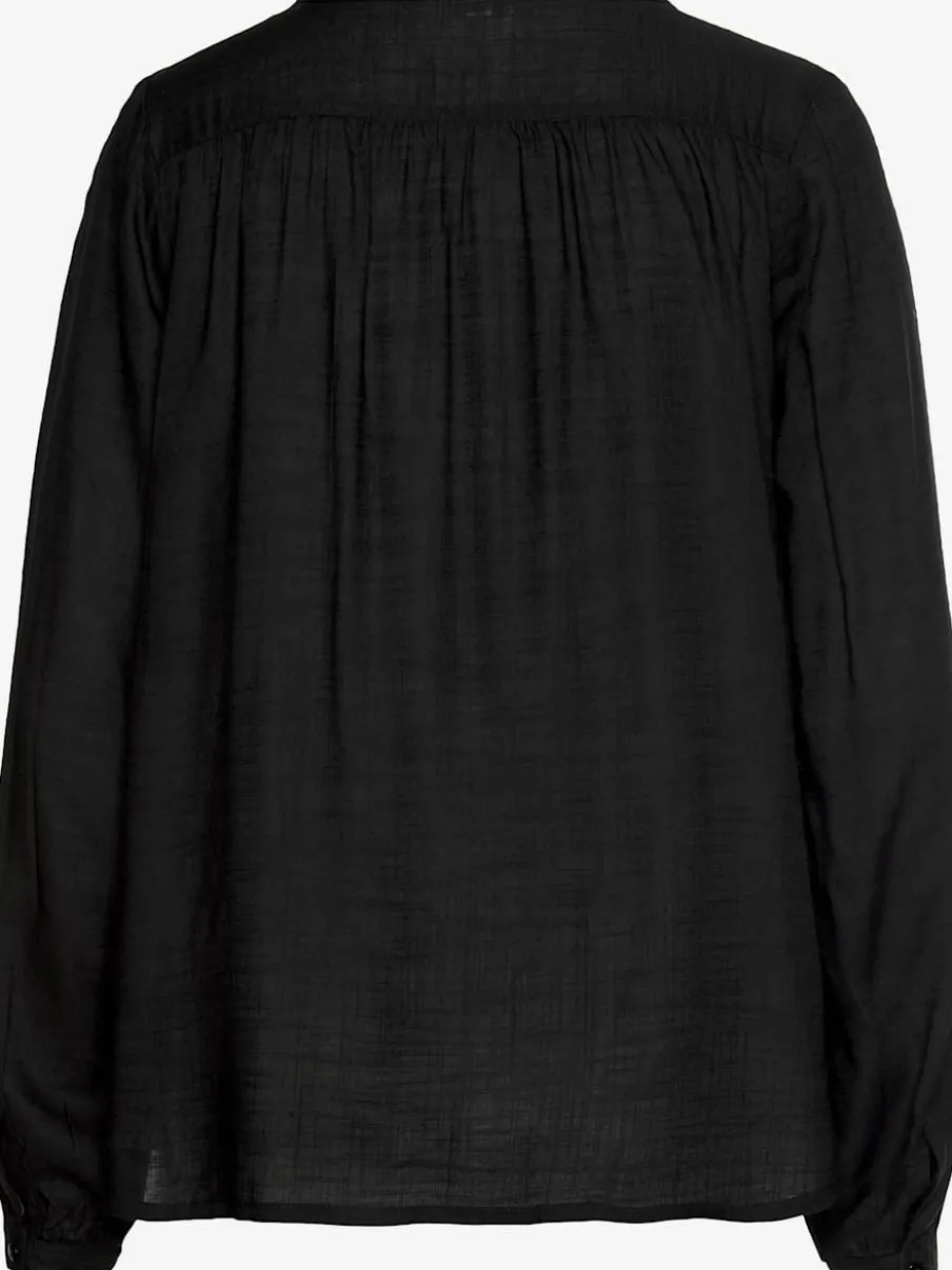 Chemisier avec patte de boutonnage et ourlet arrondi