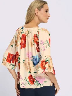 Chemisier à encolure Carmen avec motifs floraux et manches 3/4 volantes