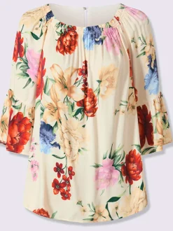 Chemisier à encolure Carmen avec motifs floraux et manches 3/4 volantes