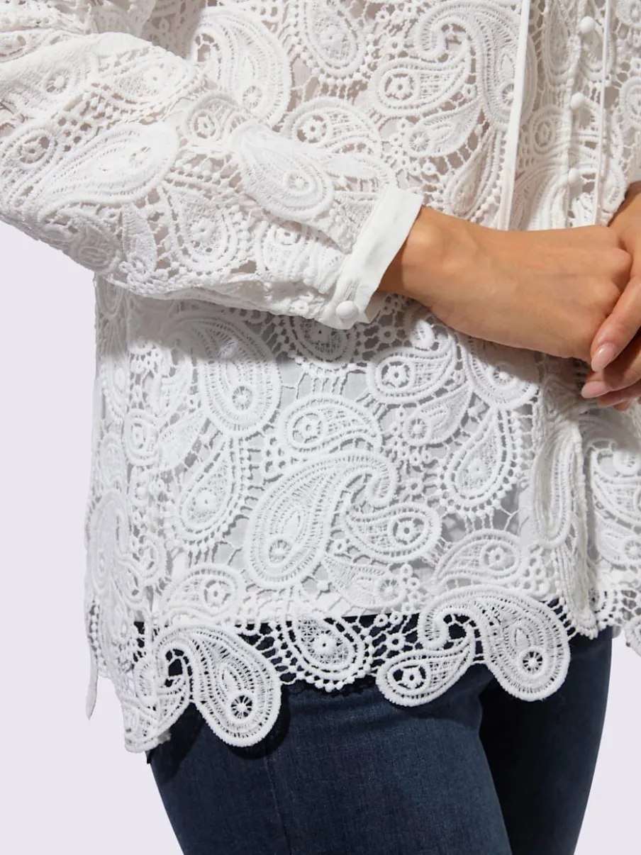 Chemisier en dentelle à col V et manches longues avec motif paisley