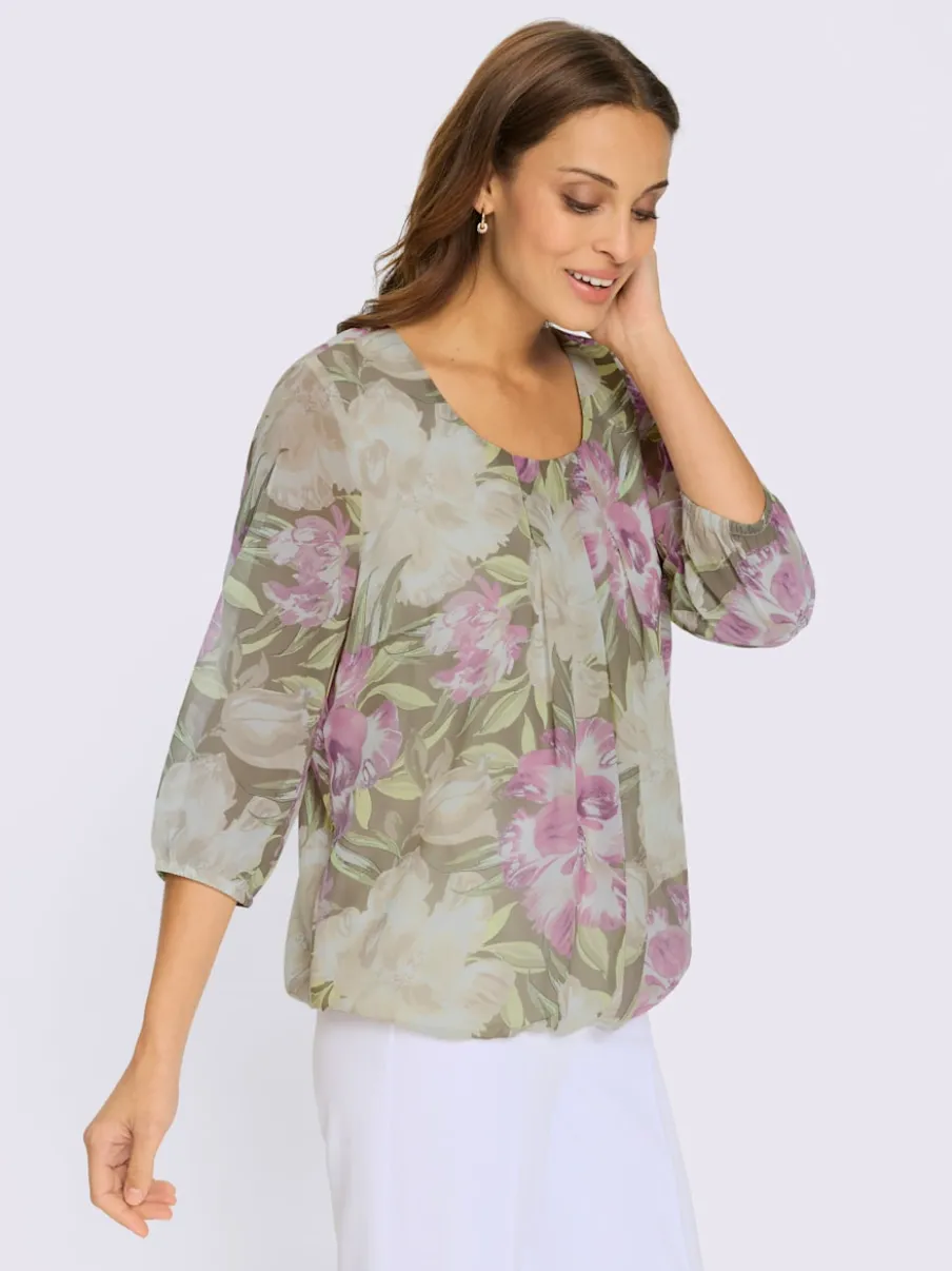 Chemisier fleuri avec col à plis et manches transparentes
