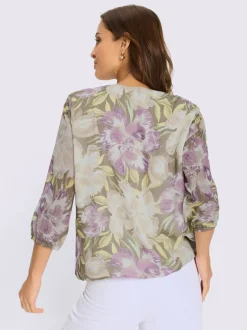 Chemisier fleuri avec col à plis et manches transparentes