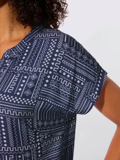 Chemisier imprimé à col V avec manches courtes et patte de boutonnage