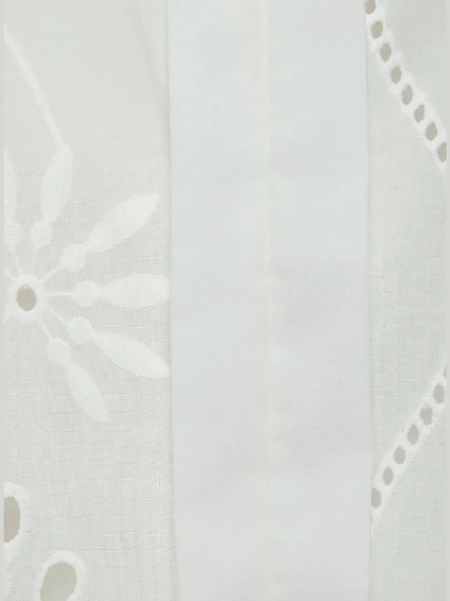 Chemisier léger en dentelle avec broderie ajourée