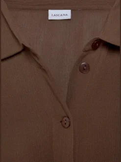 Chemisier long à col chemisier et manches courtes avec patte de boutonnage