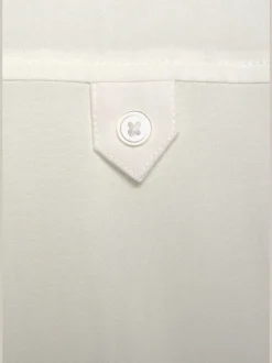 Chemisier à manches courtes avec pointes à nouer et poches poitrine