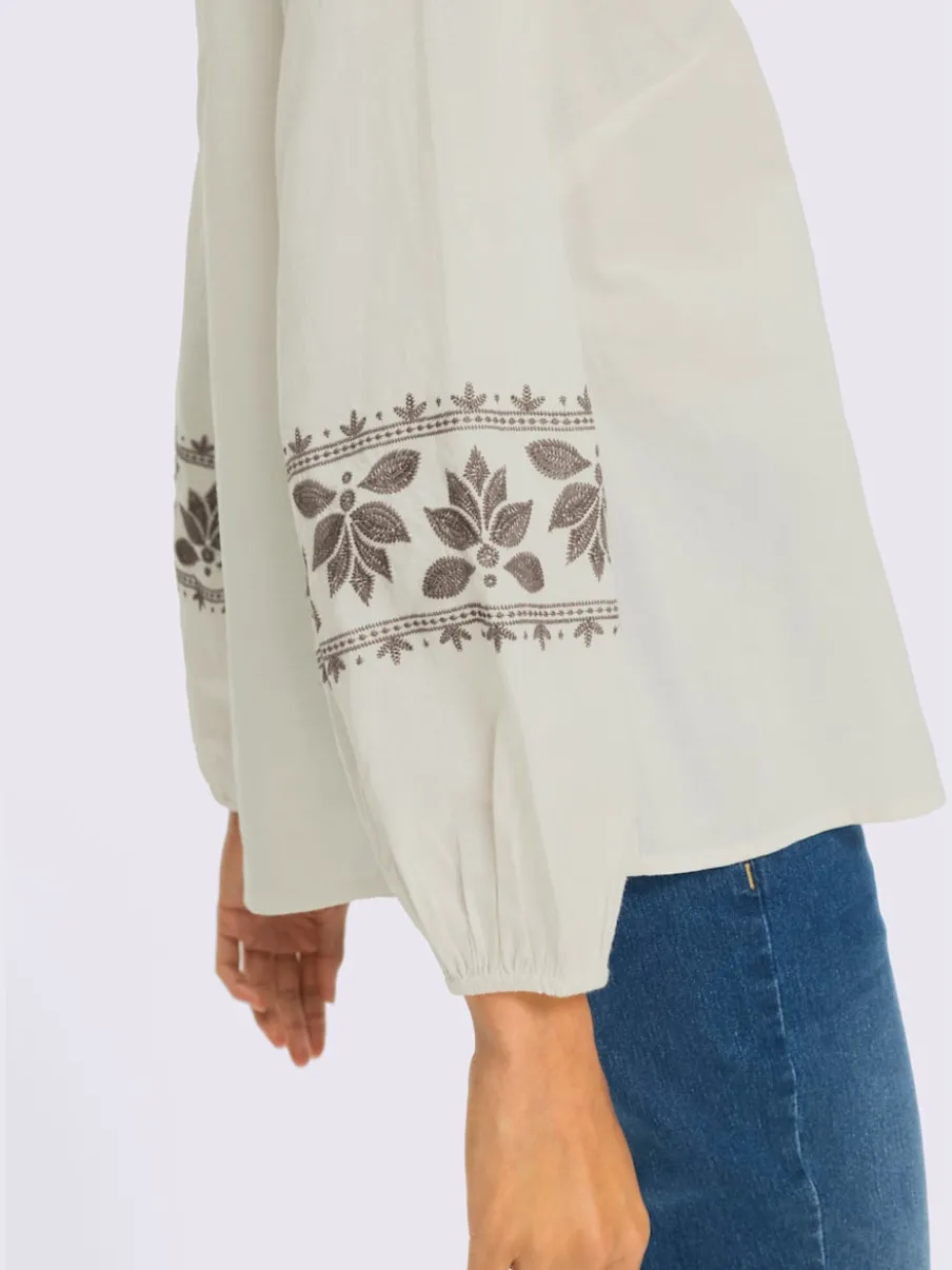 Chemisier à manches longues avec broderie florale et encolure V