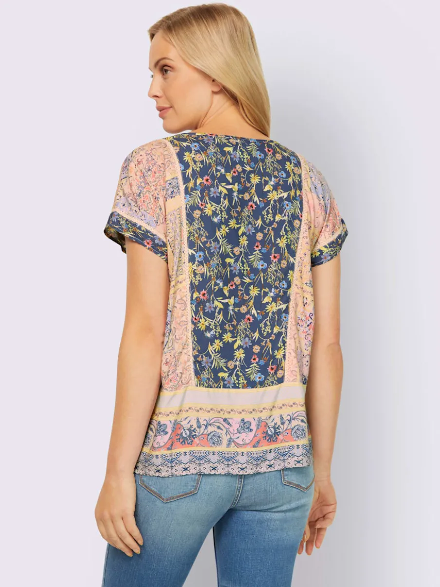 Chemisier à motif floral avec col en V et manches courtes