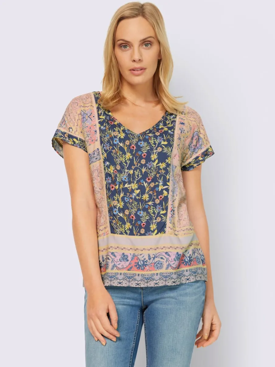 Chemisier à motif floral avec col en V et manches courtes