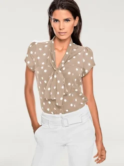 Chemisier à pois avec lavallière et manches courtes