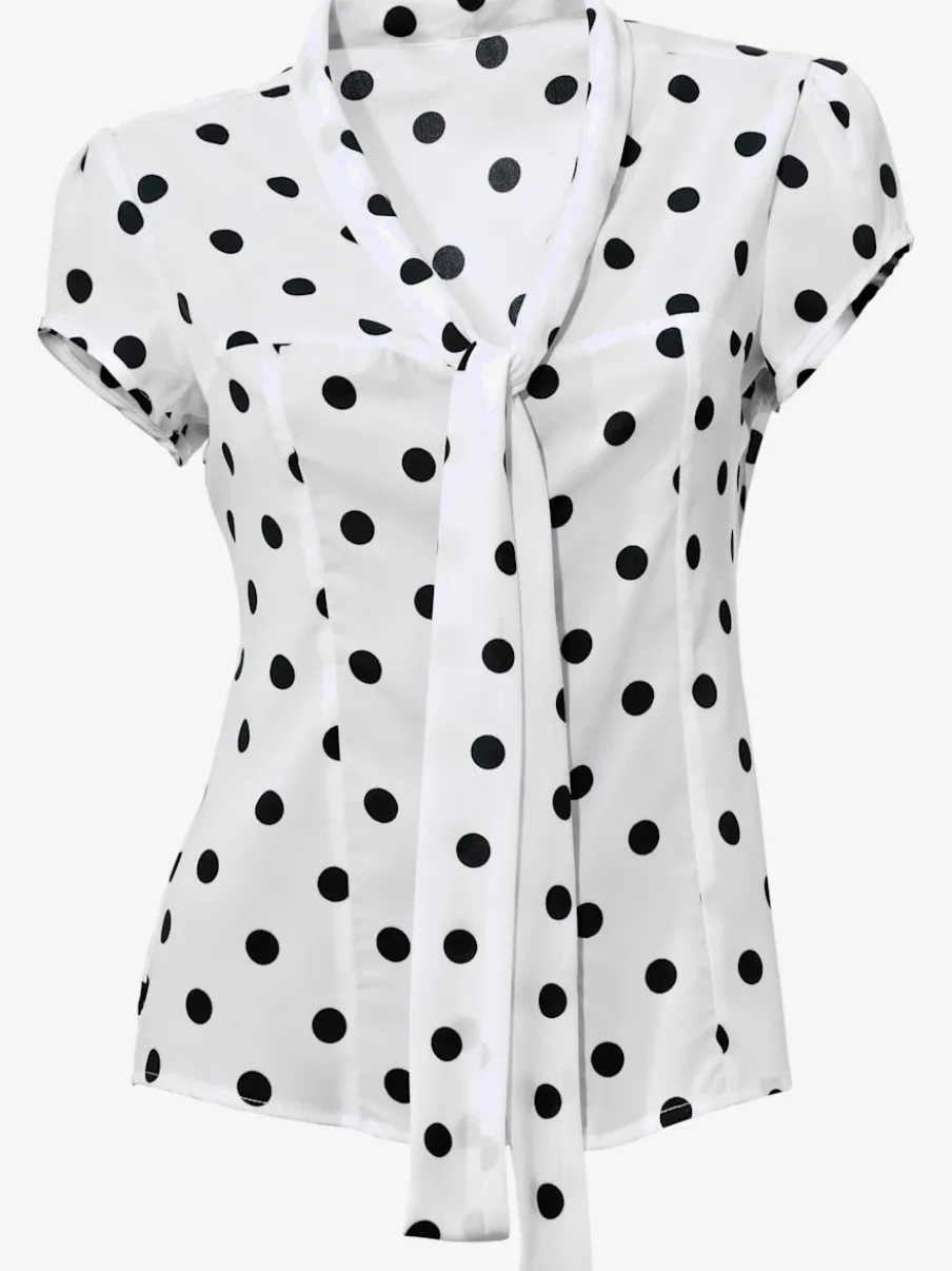 Chemisier à pois avec lavallière et manches courtes