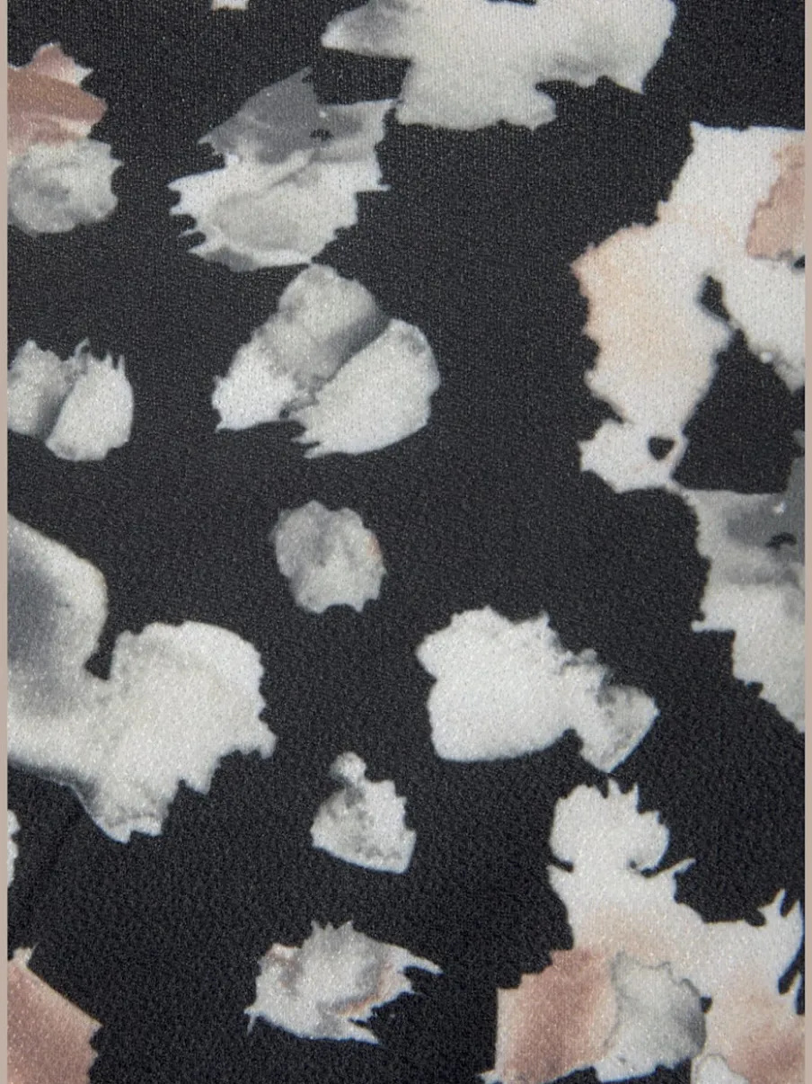 Combinaison longue à encolure en V avec motifs floraux et taille élastiquée