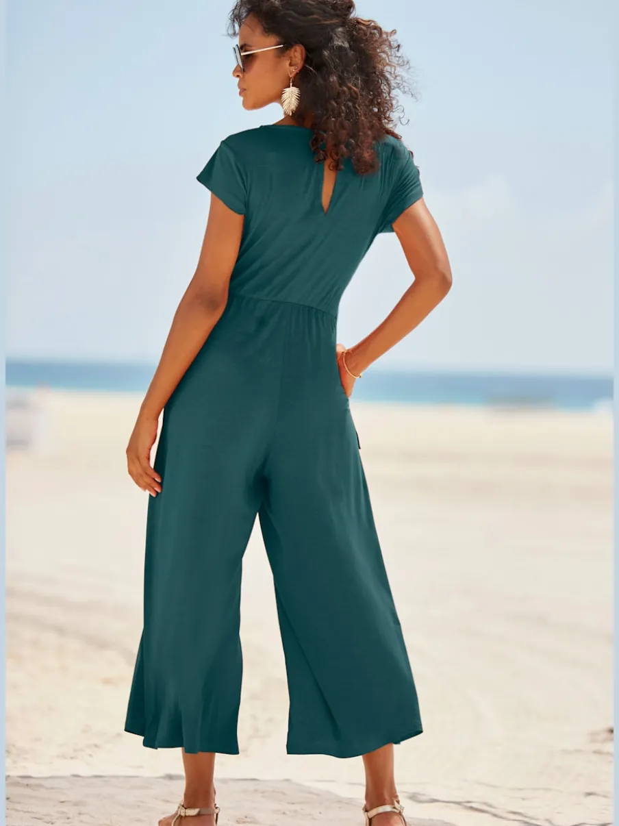 Combinaison pantalon large avec encolure ronde et manches courtes