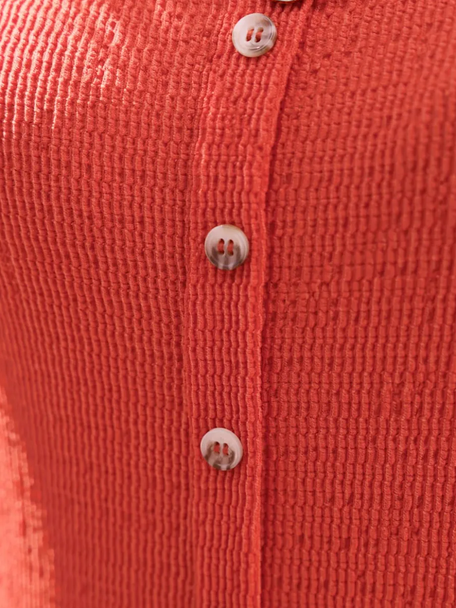 Débardeur à encolure ronde avec patte de boutonnage devant
