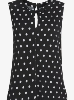 Débardeur à pois avec encolure fendue et sans manches