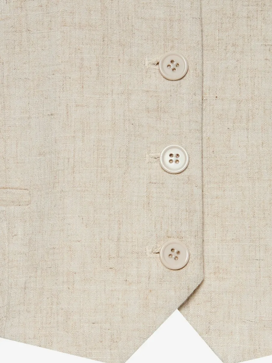 Gilet court à encolure en V avec patte de boutonnage