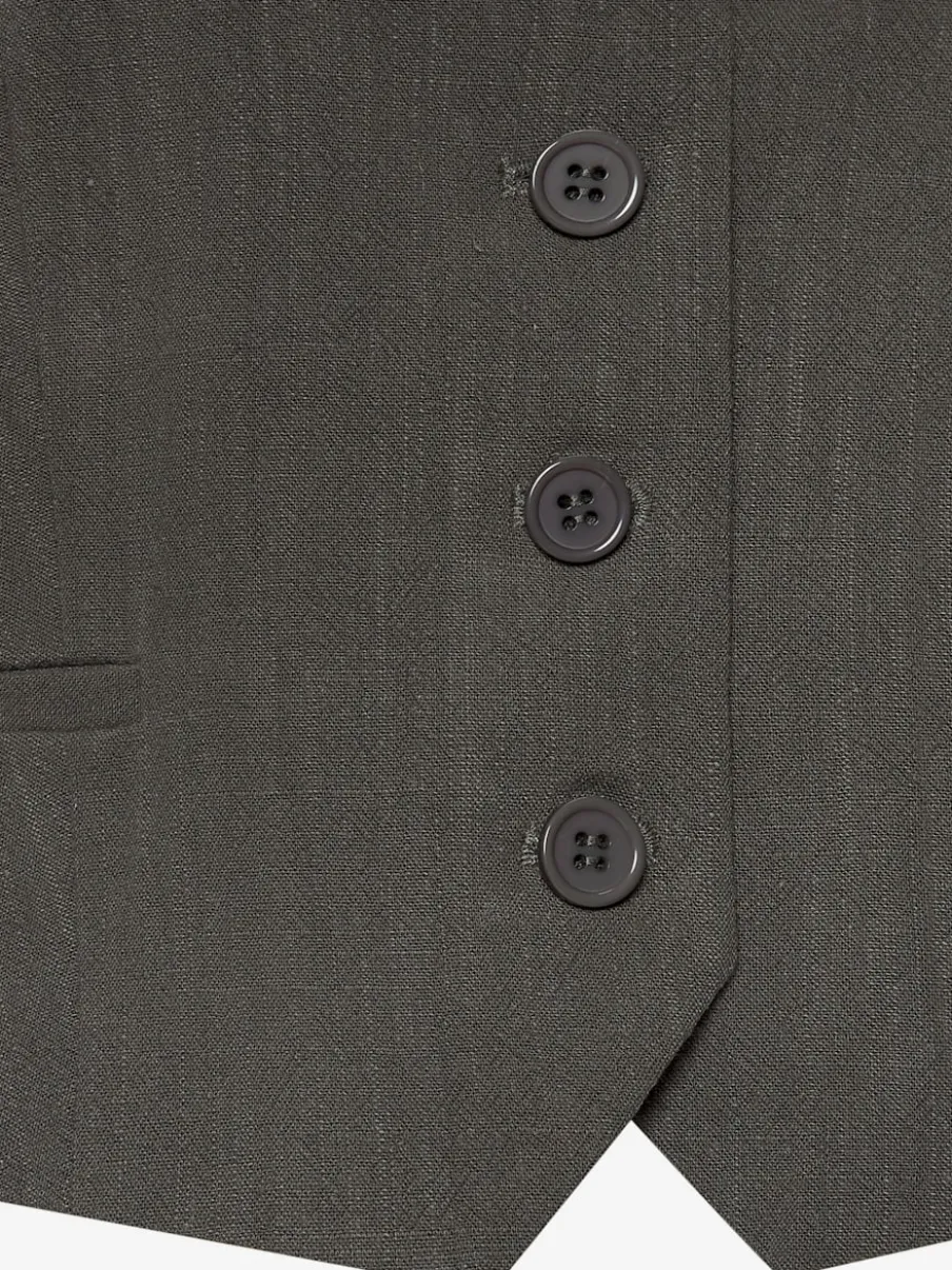 Gilet court à encolure en V avec patte de boutonnage